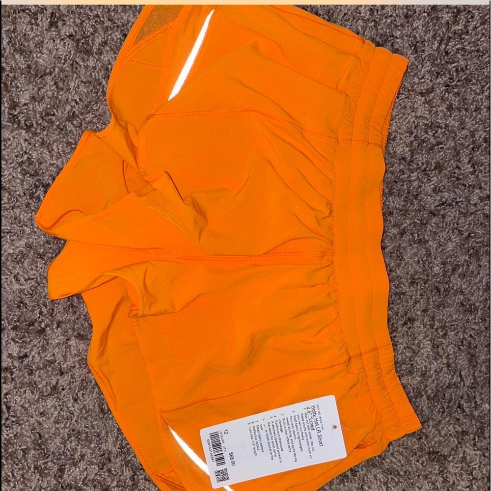 neon orange lululemon hotty hot shorts
